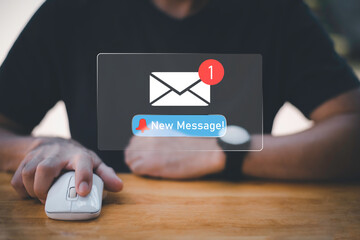 Businessman touching new message notification icon on virtual screen,email alert, online messaging system, representing digital communication, instant response, and business connectivity.