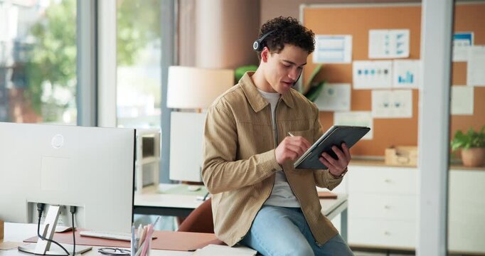 Man, headset and video call with tablet in office for discussion, editing sketch and web design. Person, talking and digital for webinar of campaign layout, feedback and brand logo for project update