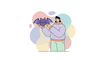 Smiling person gently holds a friendly cartoon bat Represents care nature or playful Halloween