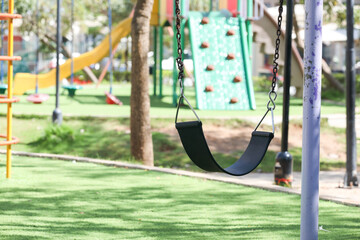 swing on playground in apartment area