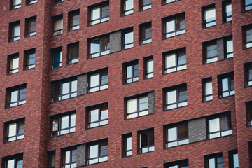 mirrored windows of the facade of an office building