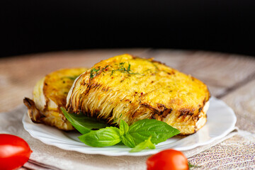 Baked cabbage wedges in crispy golden batter with herbs