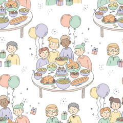 Festive gathering of diverse people around a table laden with food and balloons.