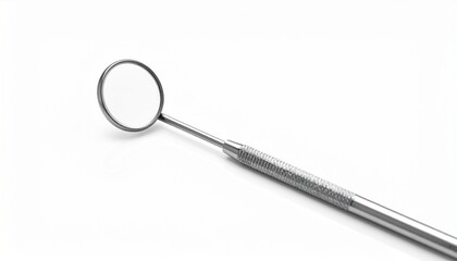 Dental mirror with round reflective surface and metal handle, angled for inspection, evoking precision, visibility, and symbolic introspection in clinical simplicity.