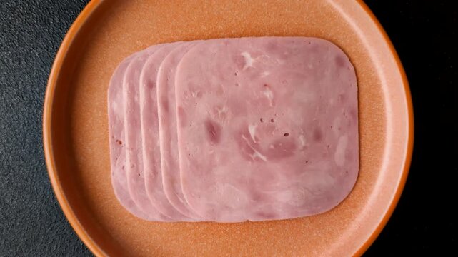 Meat, square ham sliced, organic food, protein for snacks. Sliced ham as a background