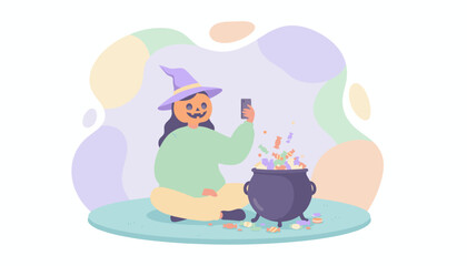 Person in pumpkin head and witch hat taking photo of candyfilled cauldron for Halloween fun