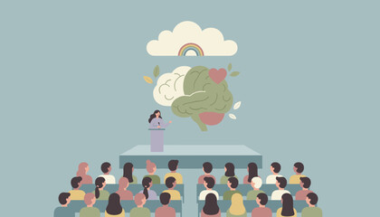 Speaker discusses mental wellness and brain health to a diverse audience at a conference
