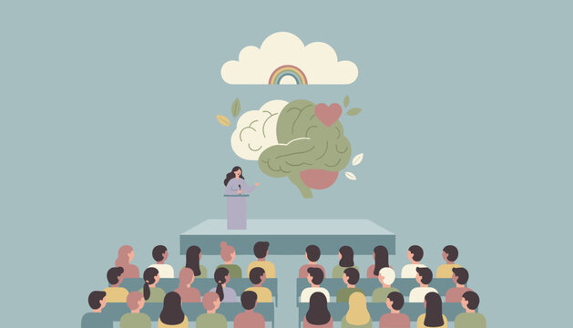 Speaker discusses mental wellness and brain health to a diverse audience at a conference