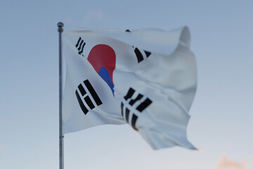 Korea national flag waving in the wind against a clear blue sky, symbolizing freedom, heritage, and pride. Patriotic concept. Travel, creative idea. Politics and Ethnicity
