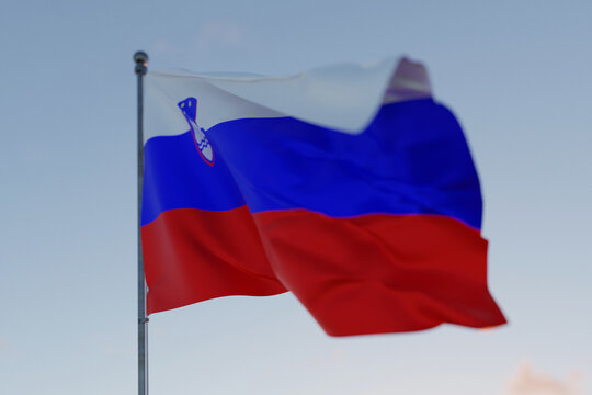 Slovenia national flag waving in the wind against a clear blue sky, symbolizing freedom, heritage, and pride. Patriotic concept. Travel, creative idea. Politics and Ethnicity