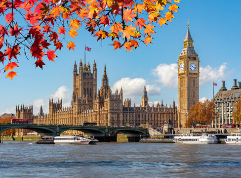Big Ben tower of Houses of Parliament in autumn, London, UK