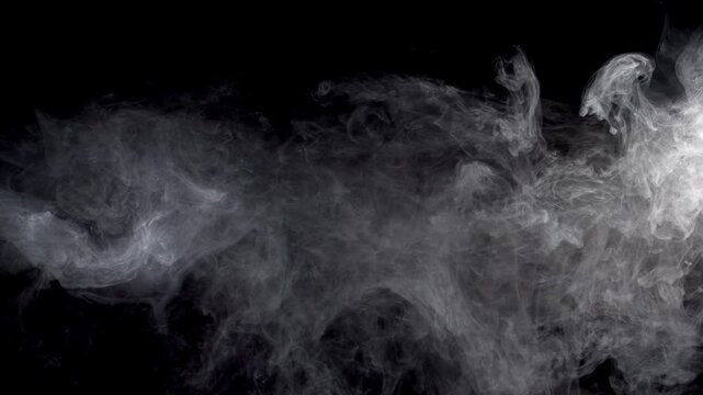 Calm real smoke with black background easy to blend in your composiotions with screen mode