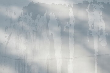 Naklejka premium Subtle wall texture with light and shadow play, perfect for design overlays and backgrounds