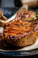 close-up of grilled pork steak with spices