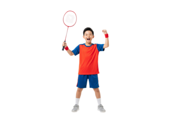 A joyful young badminton player celebrating a point with his racket raised high