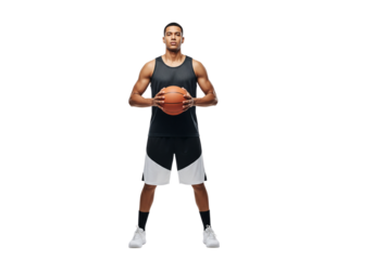 A basketball player standing firmly, holding the ball
