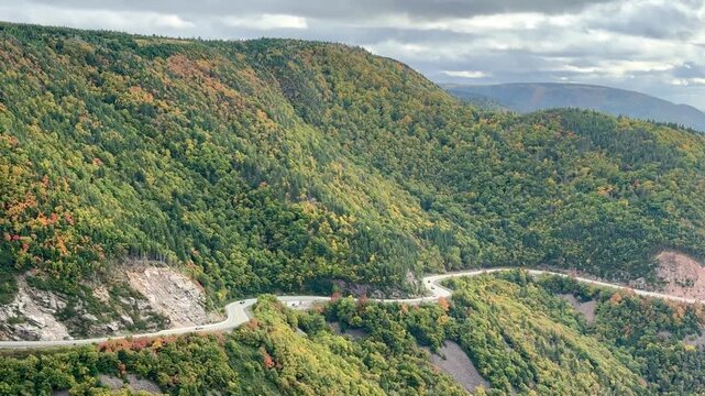 Cape Breton, Canada - September 30, 2025: Traveling by car on the unique Cabot Trail, a 300 km long panoramic road through Nova Scotia.