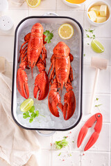 Cooked red lobster flavored with butter and orange.