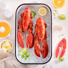 Steamed red lobster with citrus and melted butter.