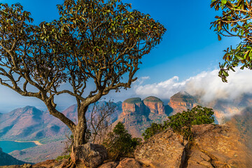 A view along the rim of Blyde River Canyon towards the three Rondavels,  Mpumalanga, South Africa...