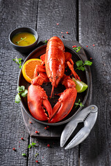 Cooked red lobster as mediterranean meal in restaurant.