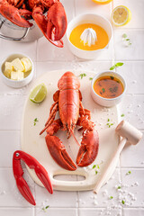 Steamed red lobster with hammer and splitting tongs.