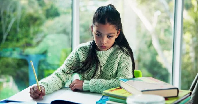 Home, writing and child with homework, education and test preparation with project, learn and study. Serious, student and girl with notebook for assignment, growth and development with knowledge