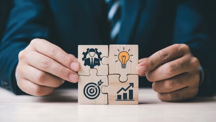 Creative businessman connecting business puzzle pieces for successful strategy and innovation vision