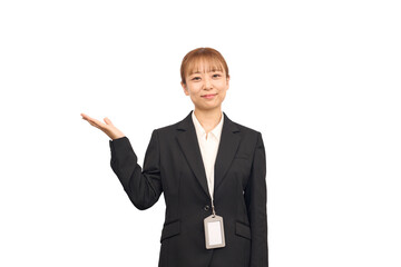 どうぞのポーズをしているビジネススーツを着た女性