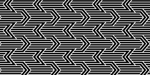 Seamless black and white geometric pattern with bold arrow shapes creating a modern optical illusion background.