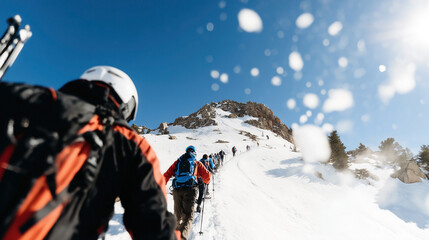 Diverse group of people enjoying teamwork while hiking in snowshoes through a snowy forest on a sunny winter day