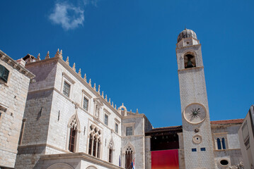 Clock tower and Gothic limestone palace