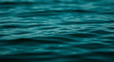 Naklejka premium Blue water surface with gentle ripples