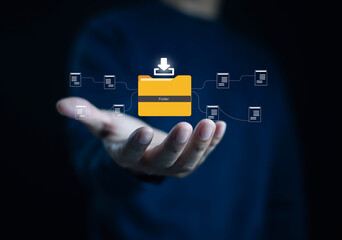 Hand holding digital folder icon with connected documents, symbolizing cloud storage, file sharing,...
