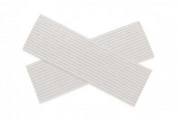 White adhesive tape pieces forming a cross, concept of repair, fixing, protection, blocking, or secrecy on transparent background
