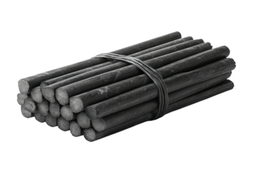 Bundle of dark, cylindrical sticks held together by a dark rubber band
