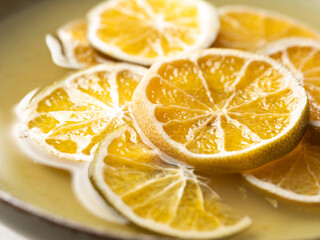 Candied unripe green tangerine slices