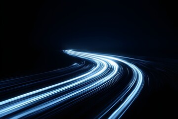 Fototapeta premium Abstract streaks of bright blue light form a dynamic swirling pattern on a dark background