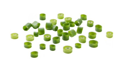 A vibrant pile of freshly sliced green scallions, cut into small circular pieces and scattered across an isolated white background for cooking