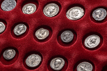 Numismatics.Authentic silver denarius, antoninianus of ancient Rome. A collector holds an old...