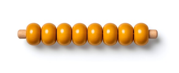 Single abacus bead isolated on white background highlighting counting skills development.