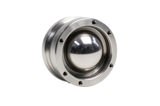 A close-up of a shiny, metallic ball valve component with surrounding metal - Powered by Adobe