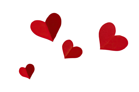 Four vibrant, red paper hearts isolated on a solid black background, conveying love & affection