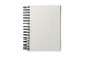 A small spiral-bound notebook with blank pages, open to a fresh sheet