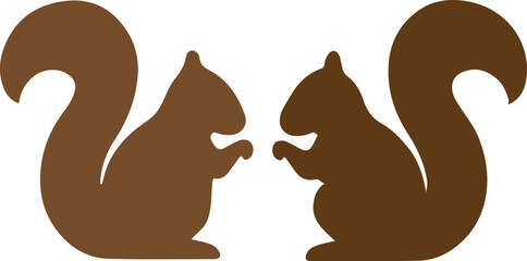 Two brown squirrels facing each other in silhouette. © Mya