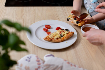 Gathering the Family to Cook Together with Our Delicious Homemade Pizza and Fresh Ingredients