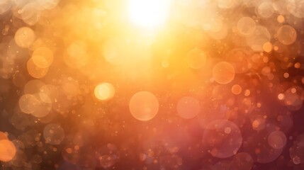 Abstract golden bokeh, soft light glowing, luminous and warm. An orange and yellow backdrop fades to crimson.