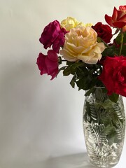 Colorful garden roses in a vase