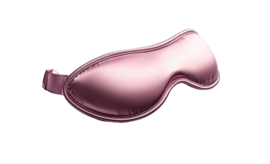 Silky, pink sleep mask with elastic strap isolated on black background