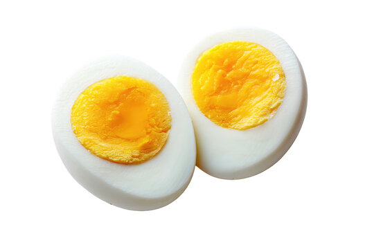 Close-up of a halved hard-boiled egg, with bright yellow yolks and white egg whites, isolated on black